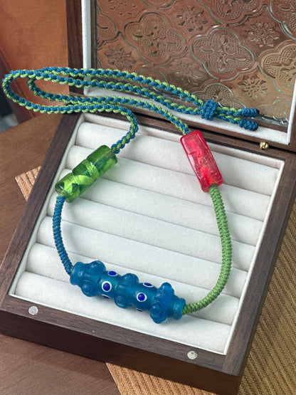 Hand-Knotted Dragonfly Eye Glass Necklace – Blue Red Green Contrast Woven Cord Jewelry