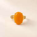 Natural amber statement ring in a gold plated setting