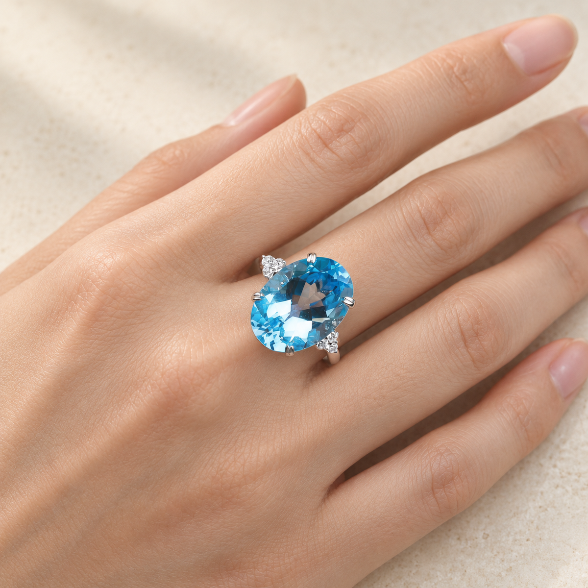 Natural Swiss blue topaz oval statement ring worn on hand