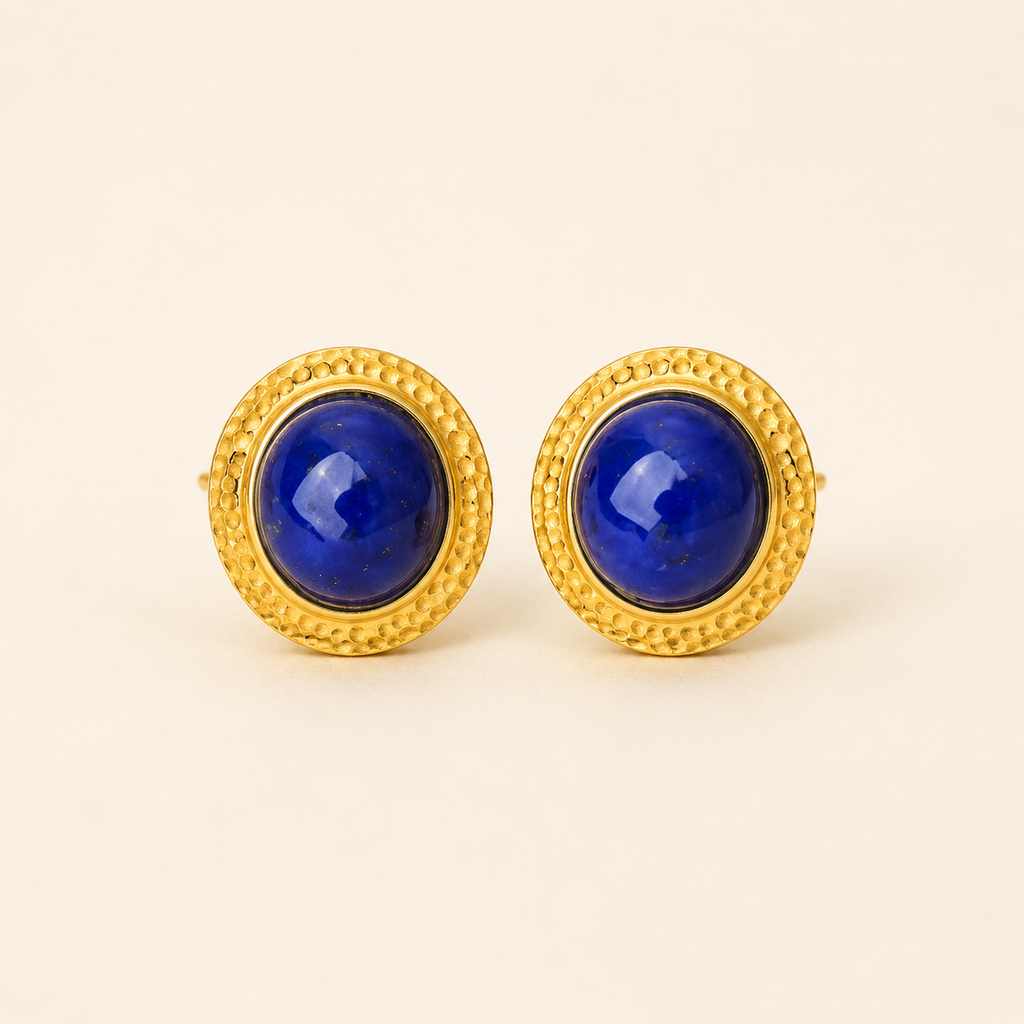 Natural lapis lazuli stud earrings on a warm ivory background