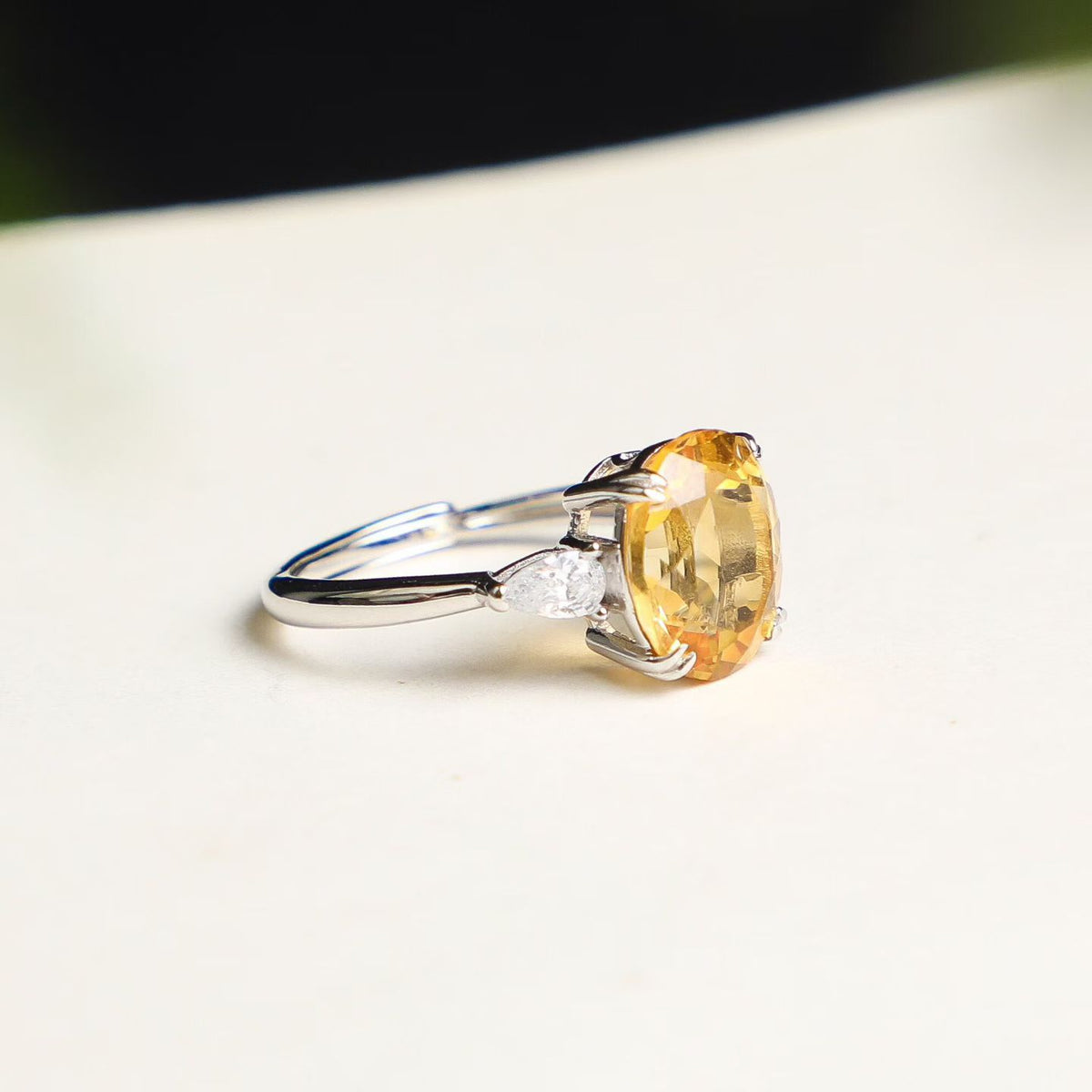 Natural Brazilian citrine oval cut three-stone ring in S925 sterling silver, side view