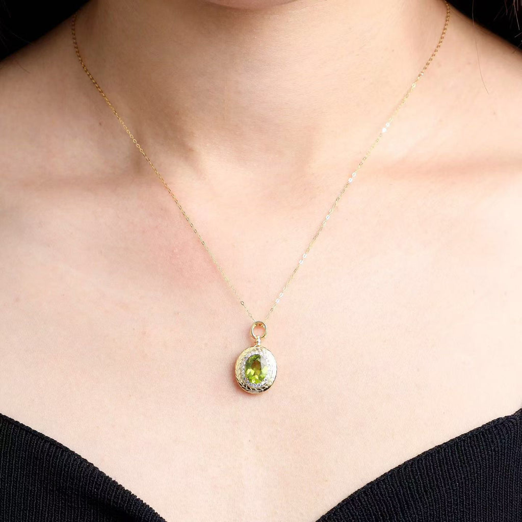 Natural peridot oval pendant necklace in 925 sterling silver worn on neckline