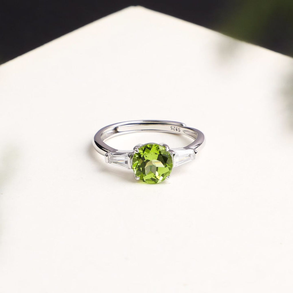 Natural 1.5 carat peridot three-stone ring in 925 sterling silver