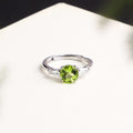 Natural 1.5 carat peridot three-stone ring in 925 sterling silver
