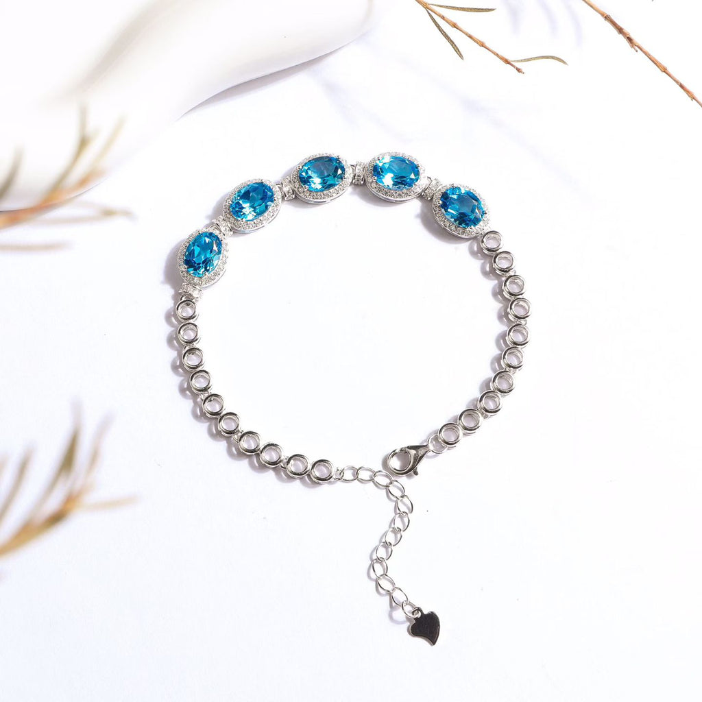 Natural Swiss blue topaz link bracelet in S925 sterling silver, full product view