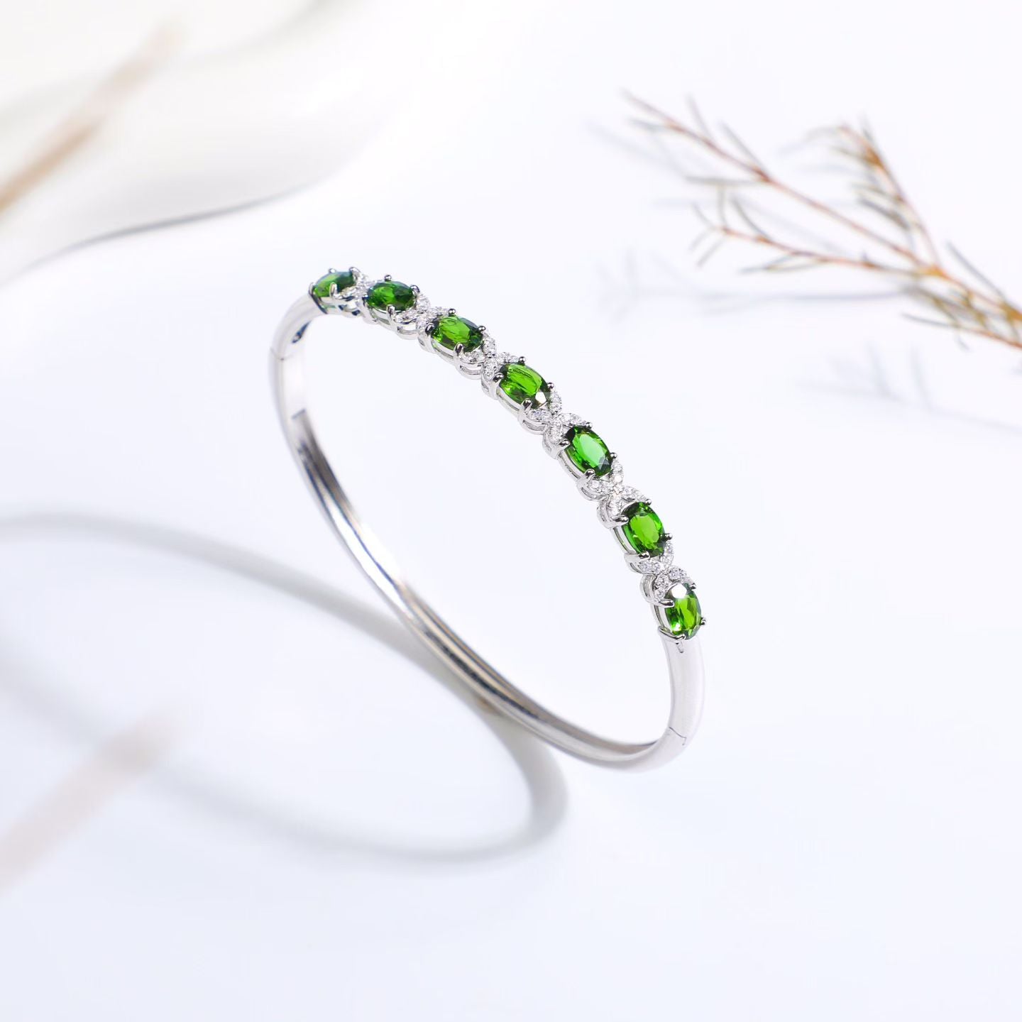 Natural chrome diopside bangle bracelet – angled view